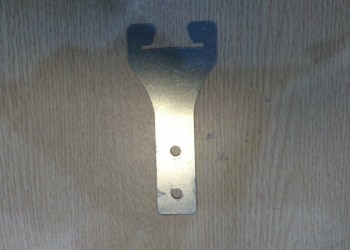 Móc treo xương tam giác